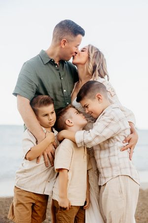 Oahu Family Photographer captures a family at sunset in Hawaii.