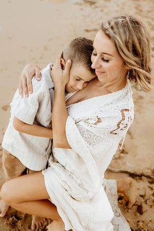 Oahu Family Photographer captures a family at sunset in Hawaii.