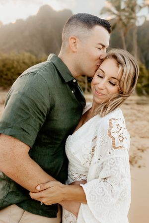 Oahu Family Photographer captures a family at sunset in Hawaii.