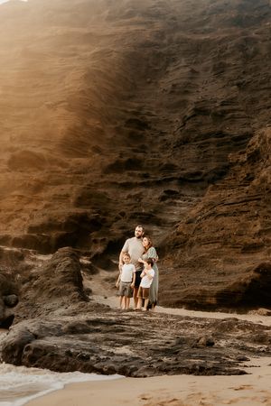 Oahu Family Photographer captures a family at Halona Cove in Hawaii.