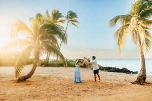 Oahu Family Photographer captures a family at sunset in Hawaii.