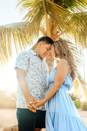 Oahu Family Photographer captures a family at sunset in Hawaii.