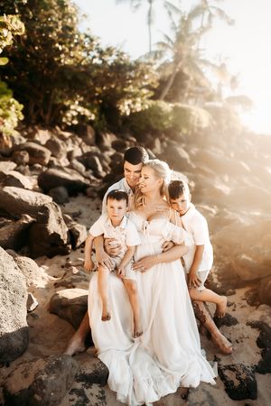 Oahu Family Photographer captures a family at sunset in Hawaii.