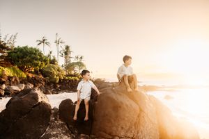 Oahu Family Photographer captures a family at sunset in Hawaii.