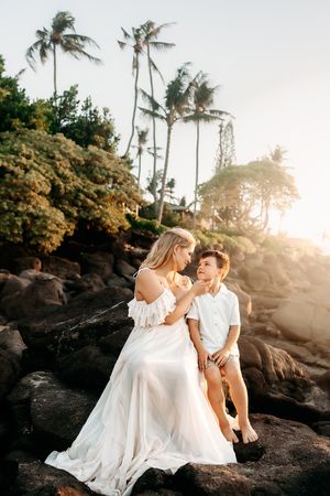 Oahu Family Photographer captures a family at sunset in Hawaii.