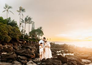 Oahu Family Photographer captures a family at sunset in Hawaii.