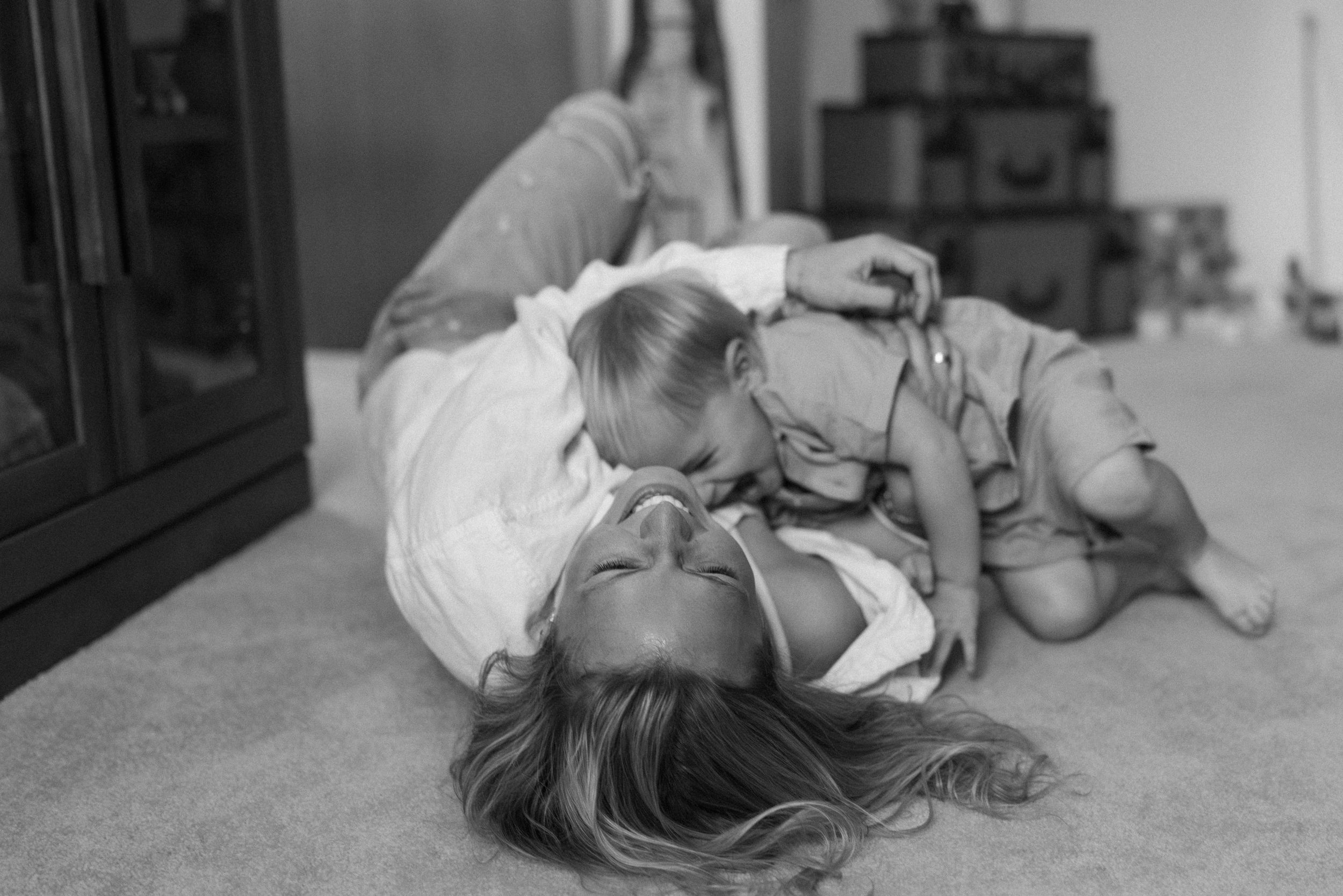 parenthood, love, new parents, vintage vibes, aesthetic, michigan, family, kisses, toddler, childhood, black and white