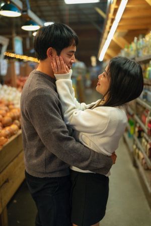 love, lovers, nontraditional photoshoot, grocery store, lansing michigan, engaged, to be married, newlyweds,