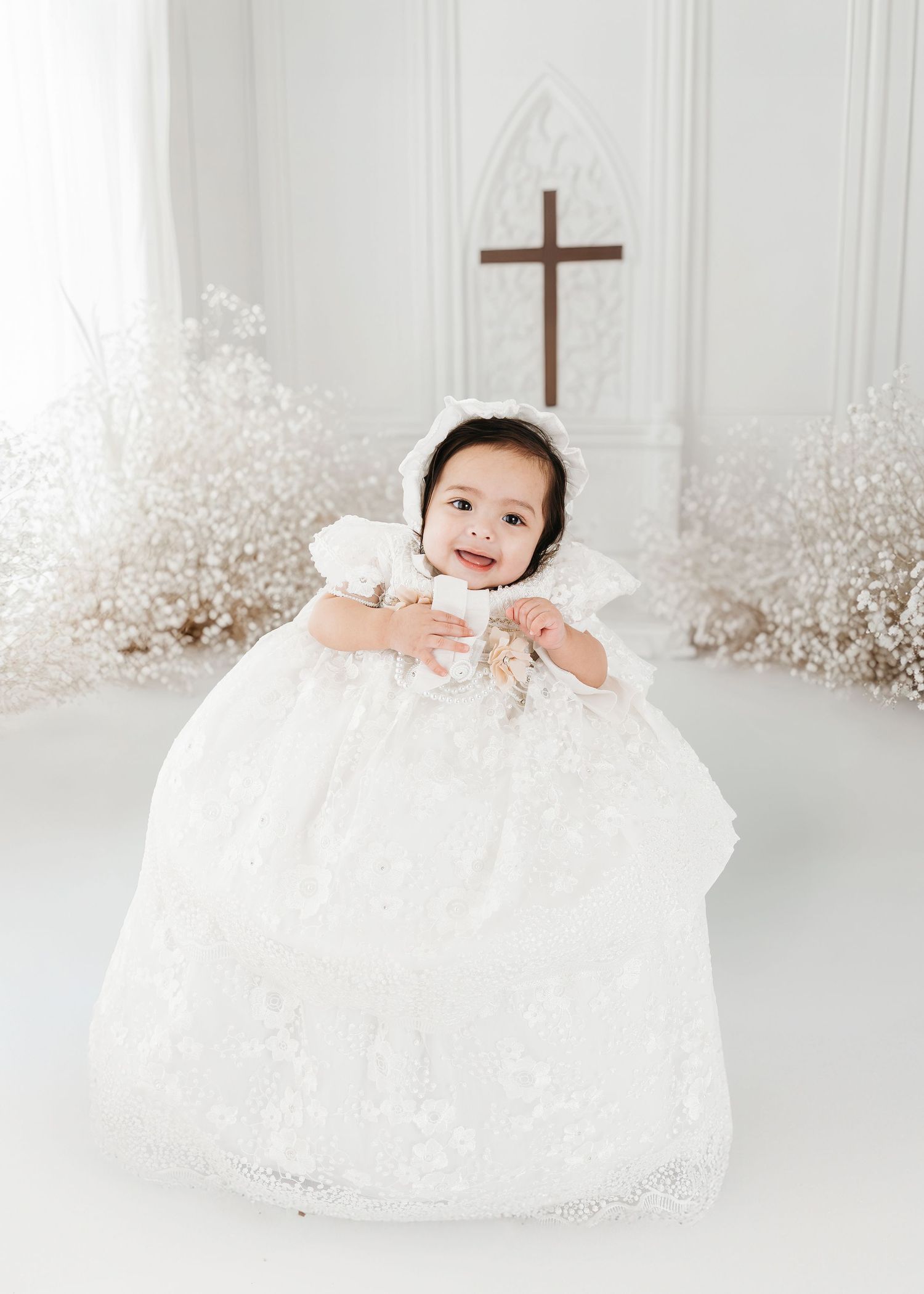 Baby in white christening gown with cross – baptism photography by Maria Chao - Sacramento Photographer