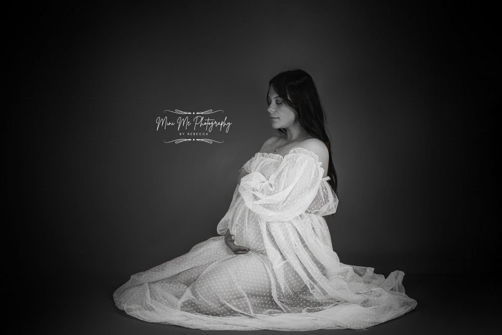Professional Maternity photoshoot black and white on floor