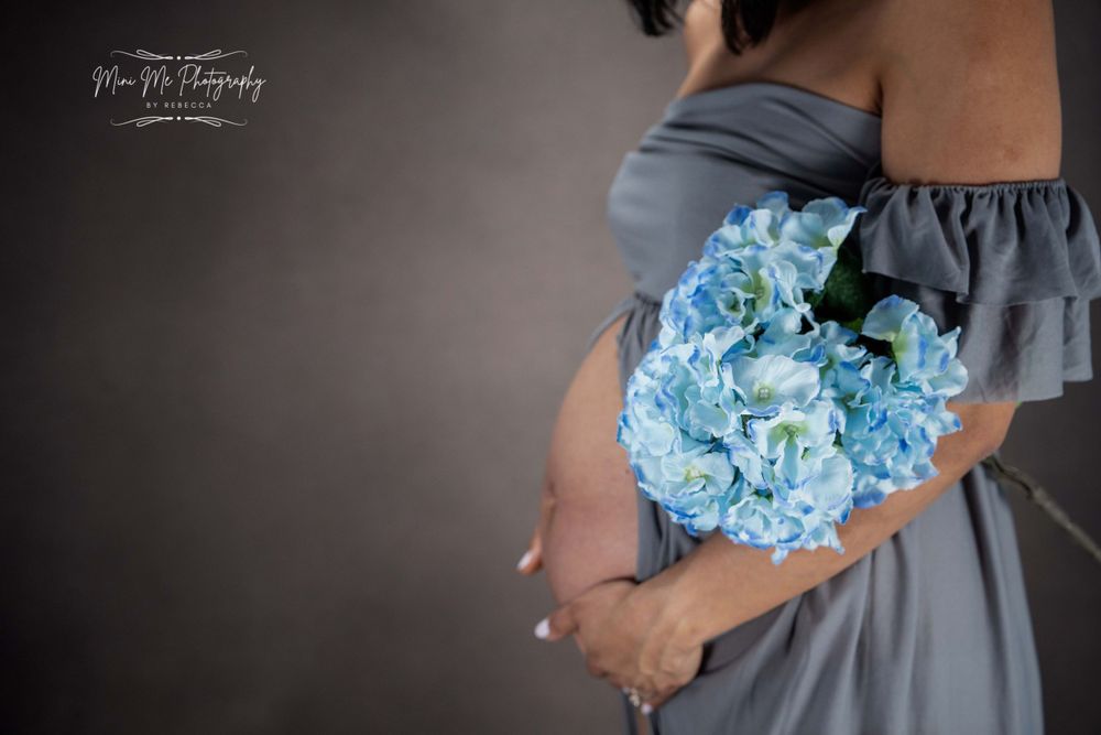 Professional Maternity photoshoot with blue flowers