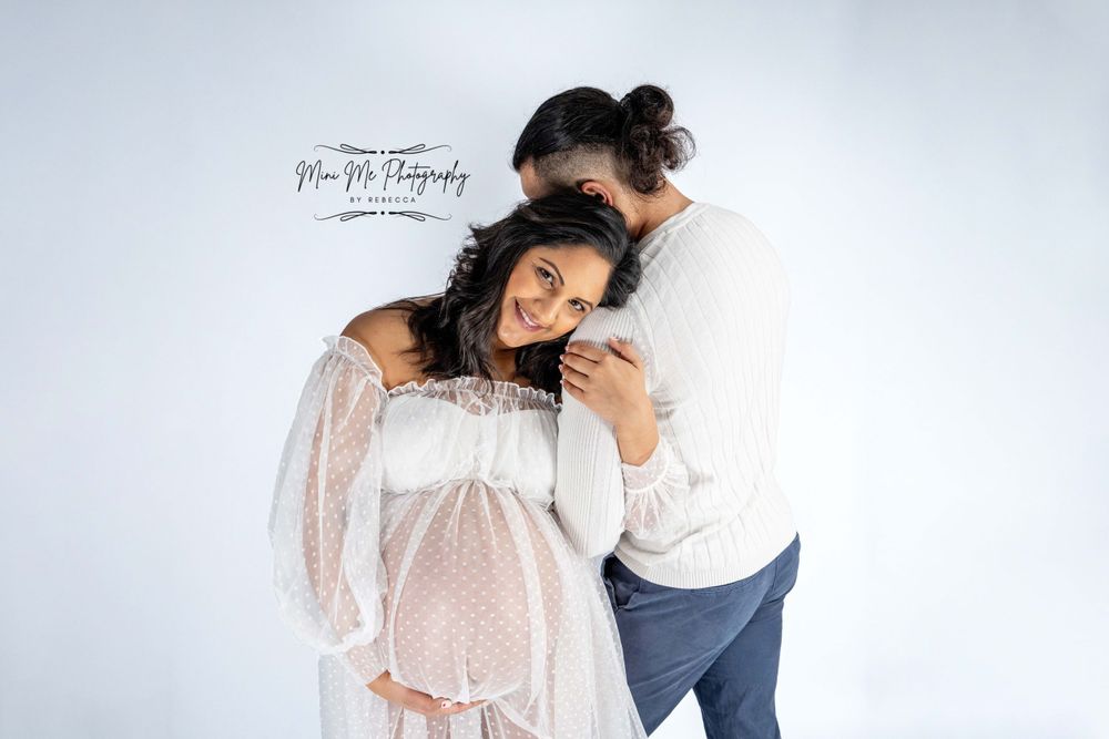 Professional Maternity photoshoot with husband hugging