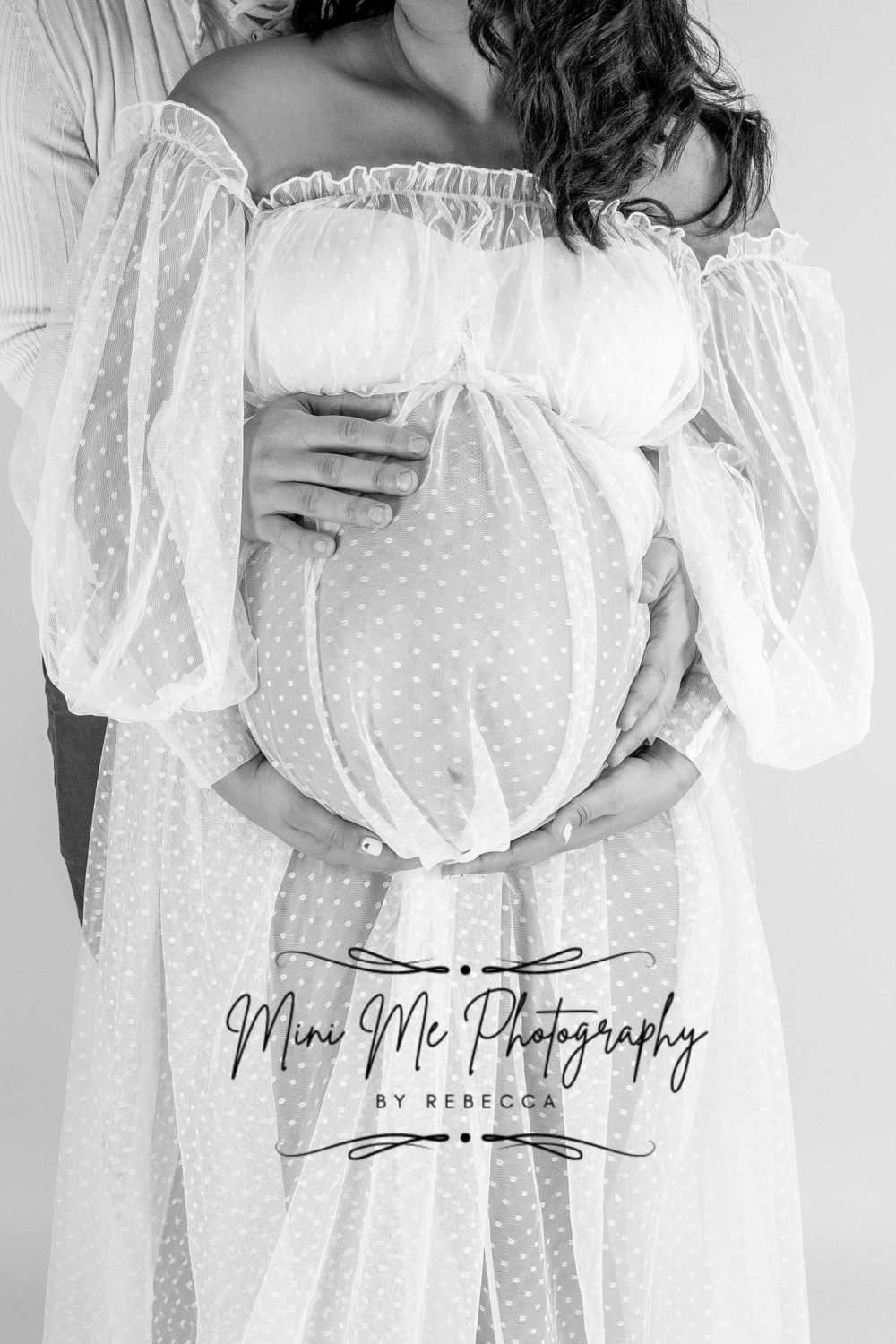 Professional Maternity photoshoot holding belly