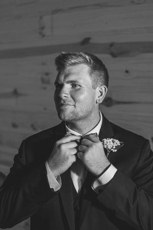 Black and white portrait series showing emotional expressions in formal attire.