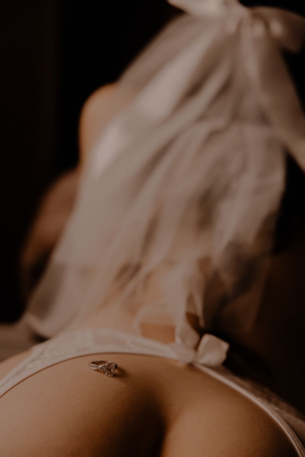 ring on bum poses. bridal boudoir poses