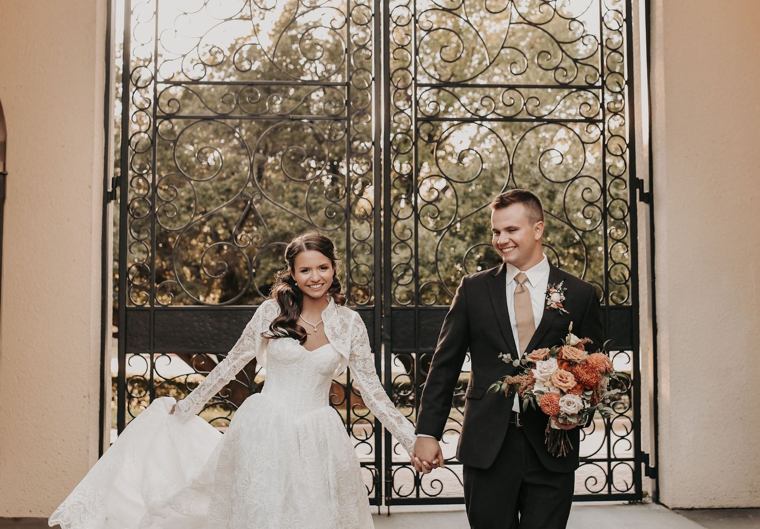 Bride and groom smiling together after St Ann Catholic Parish ceremony in coppell