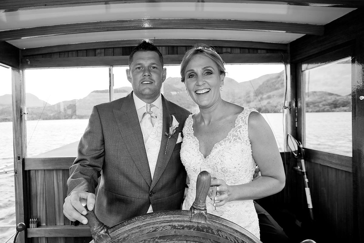 Bride and groom inside the wheelhouse on the Ullswater steamer