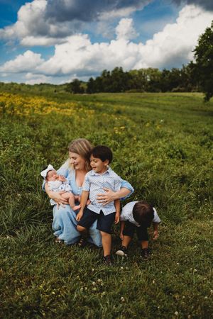 Parents with their children during a natural family photography session in Knoxville, TN