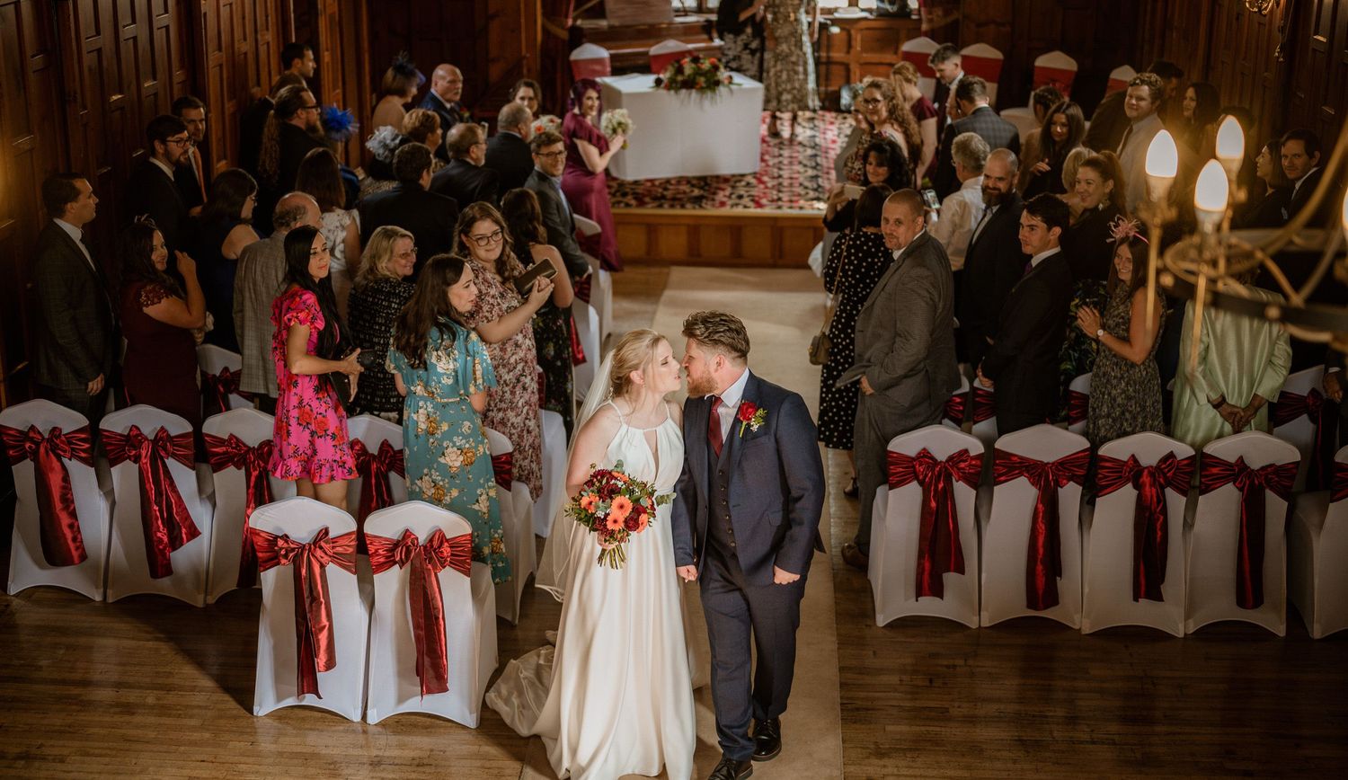 Jessica and Nick ceremony aisle at Worsley Court House Salford wedding