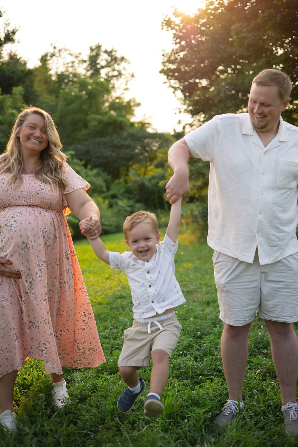 Family having fun during an outdoor golden hour session photo session