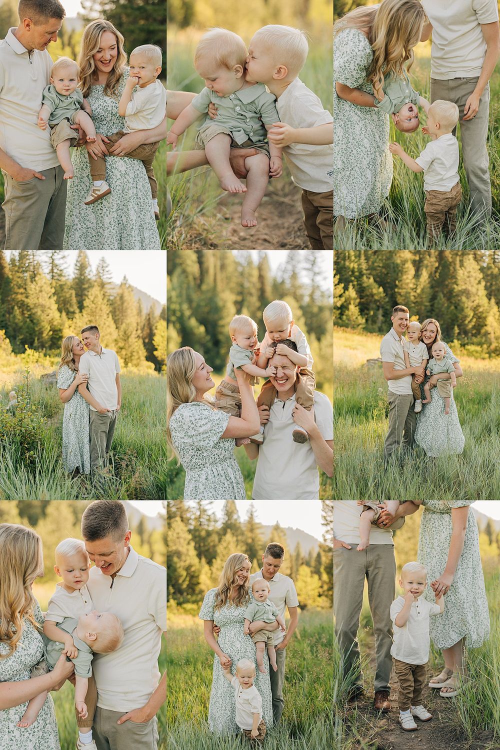 Family of four poses in a sunlit green meadow with pine trees, parents holding two young toddlers in coordinating neutral outfits.