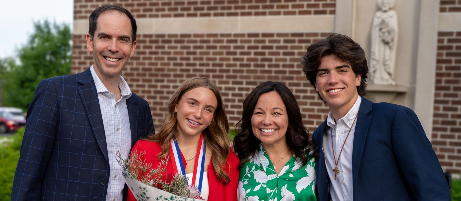 Family portrait following catholic confirmation.