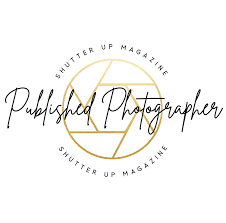 Shutter Up Magazine Published Photographer logo with golden camera aperture design and elegant script typography.