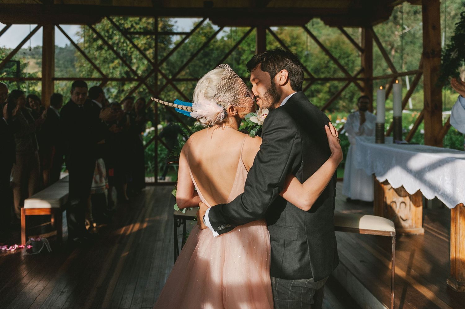 A collage of wedding photos showing emotional moments between loved ones during a celebration.