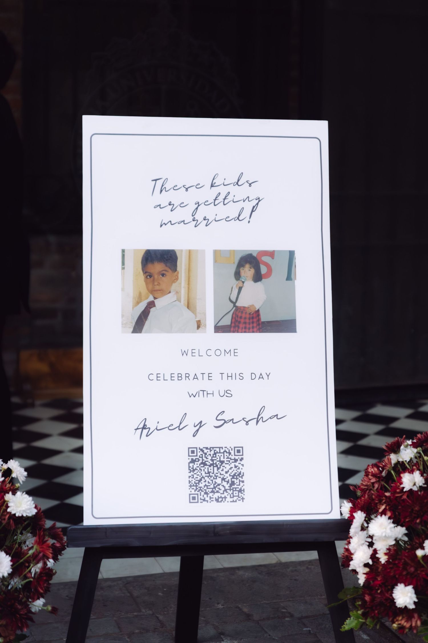 Wedding welcome sign reading These Kids Are Getting Married with childhood photos of Ariel and Sasha.