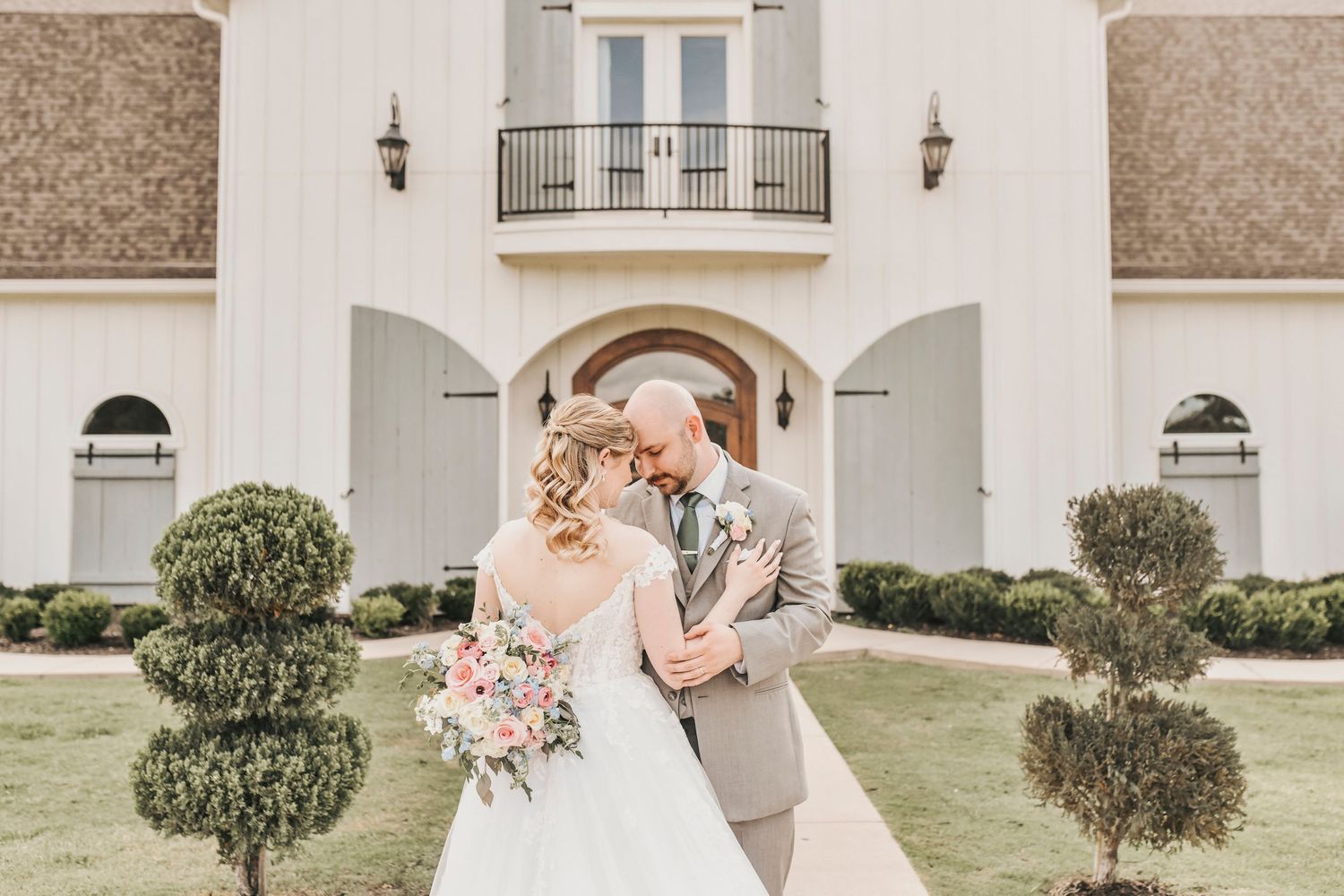 Romantic North Texas wedding party portraits outside The French Farmhouse