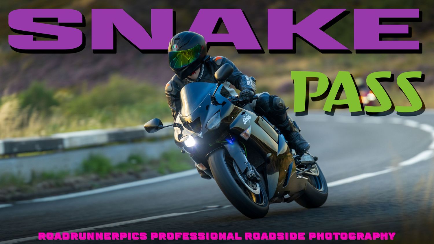 A motorcyclist rides a Monyash B5055 bike on a rural country road with another rider visible in the distance.