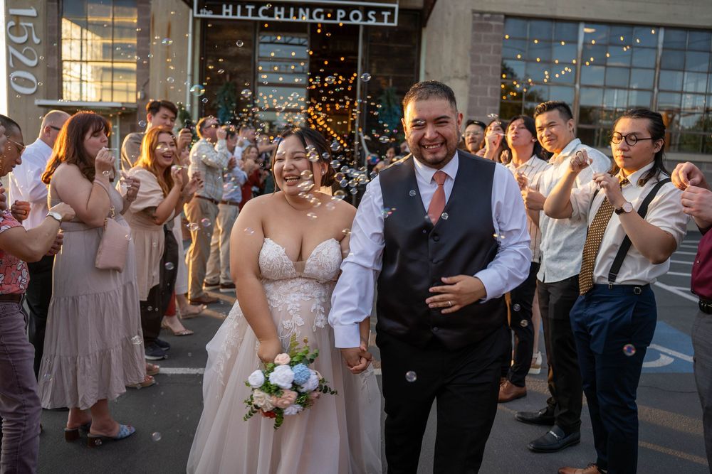 Joyful bubble send-off for bride and groom at golden hour at The Hitching Post in Springville, UT, captured by N&D Media Production.