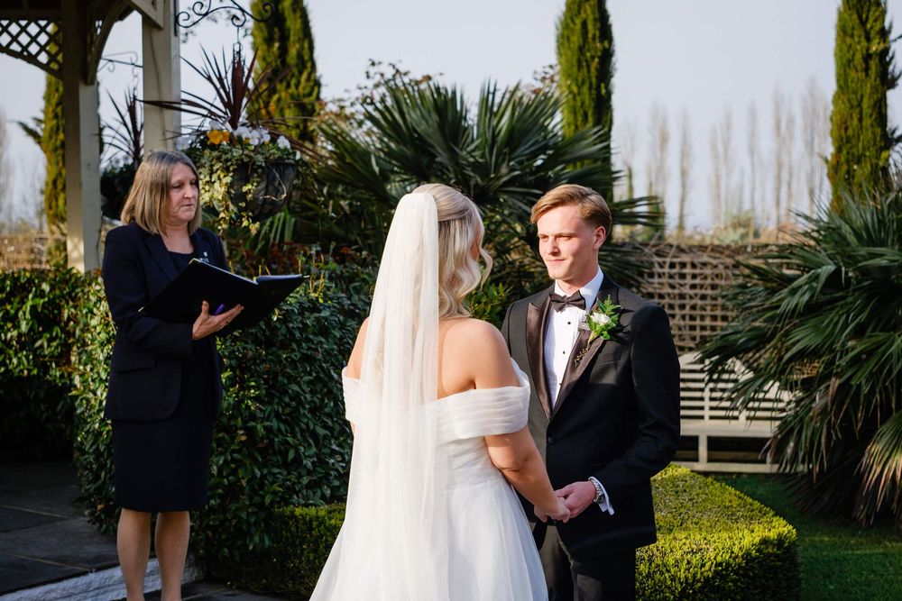 bride and groom at wedding ceremony in knowle country house Kent