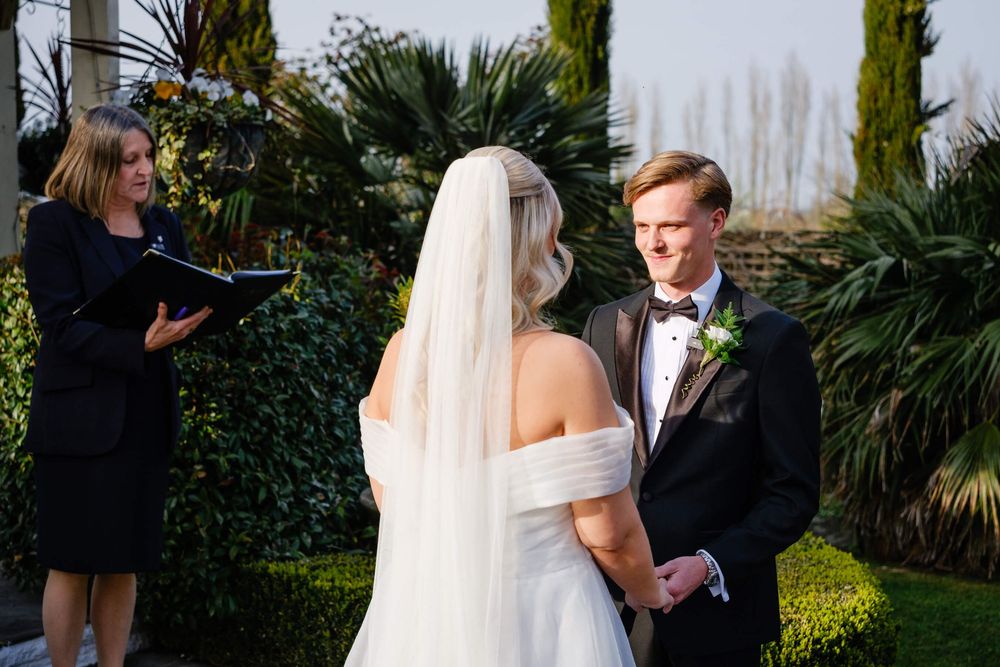 groom looks at bride in Kent wedding