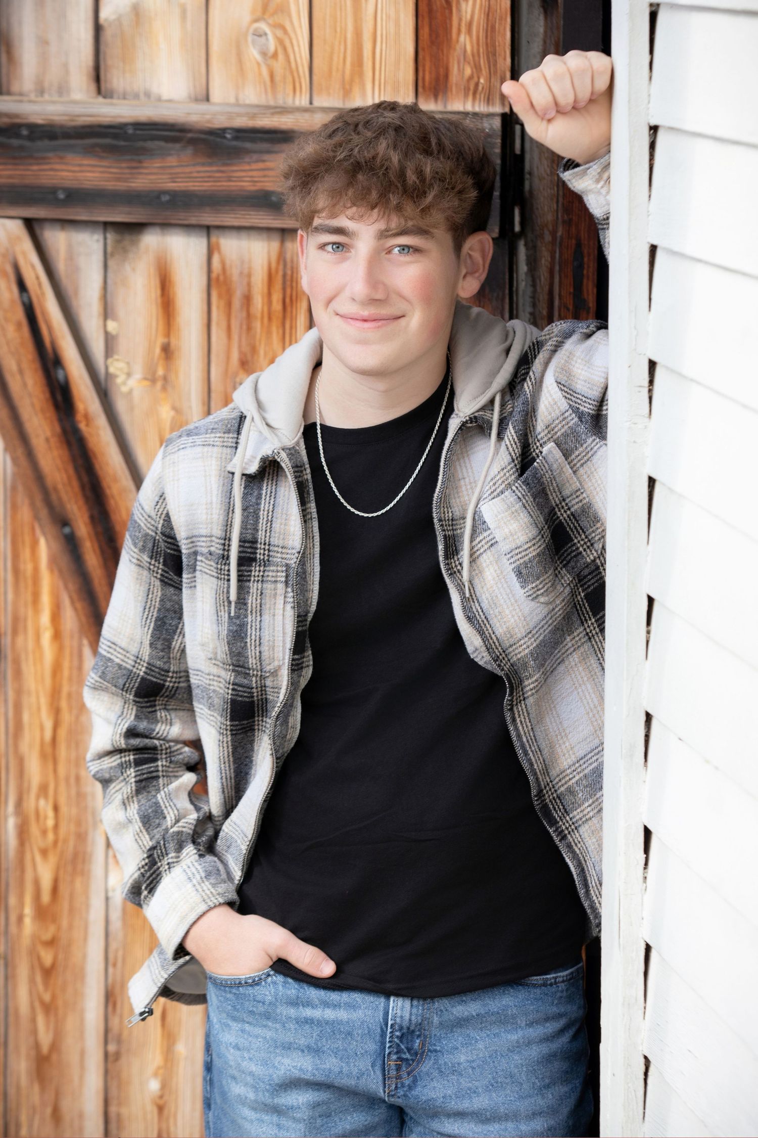 Olentangy Liberty senior portrait session at Slate Run Metro Park with country scenery, red barn, and golden light.