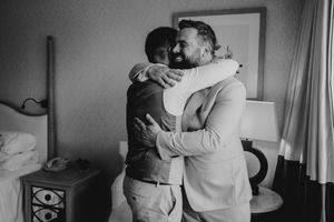 A series of black and white photographs showing couples dancing and embracing in intimate moments.