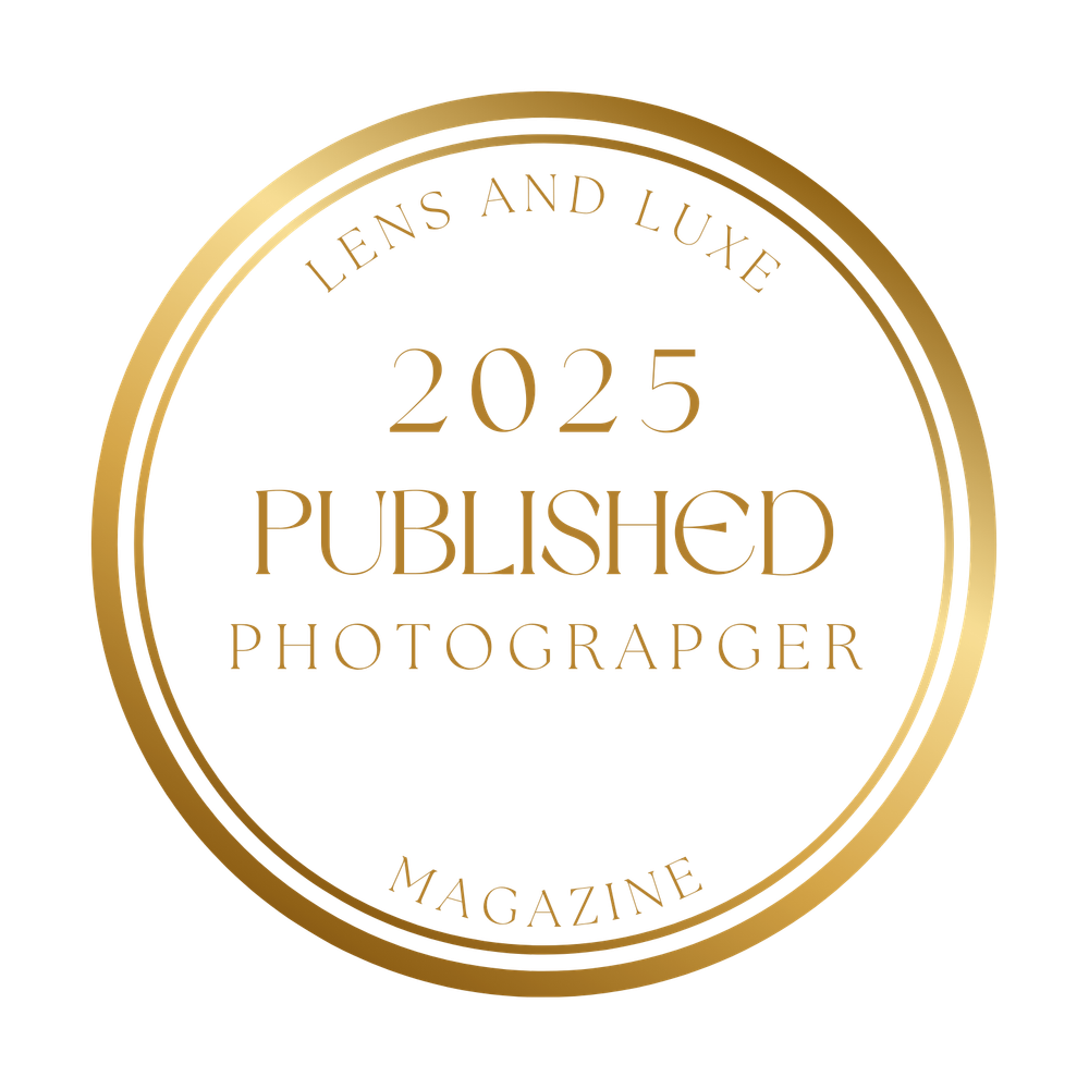 A circular golden badge or seal displaying 'Lens and Lens Magazine 2025 Published Photographer' text.