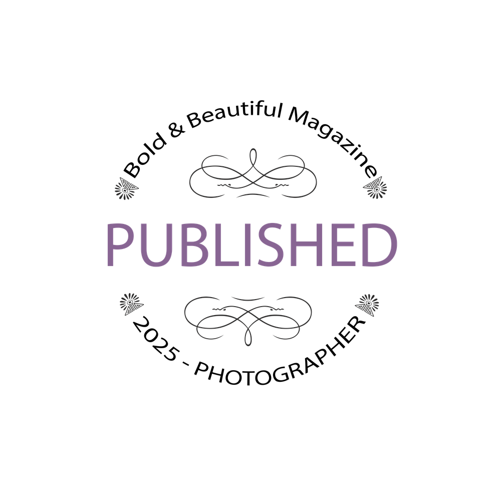 A purple glowing text that says PUBLISHED with decorative flourish designs around it on a black background.