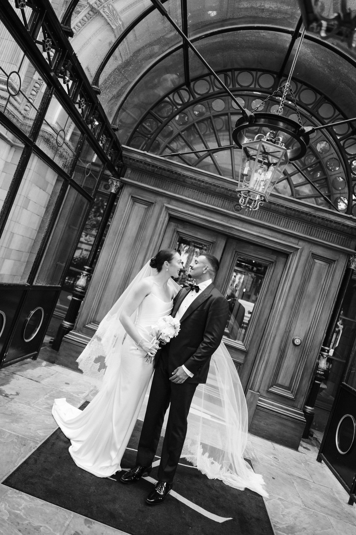 bride and groom hands with new wedding bands taken wedding by editorial wedding photographer