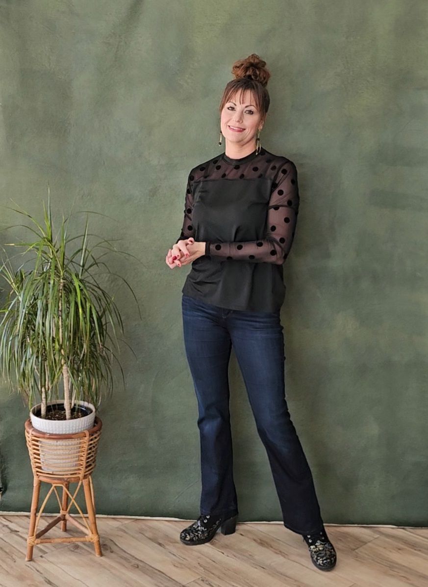 A sequence of four photos showing a person in dark jeans and sheer top standing next to a potted plant on a wooden stand.