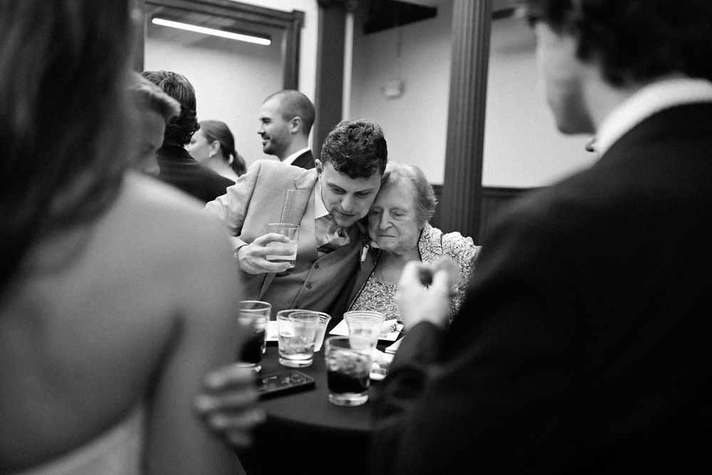 A black and white photo sequence shows people playing cards around a table in what appears to be a casual setting.