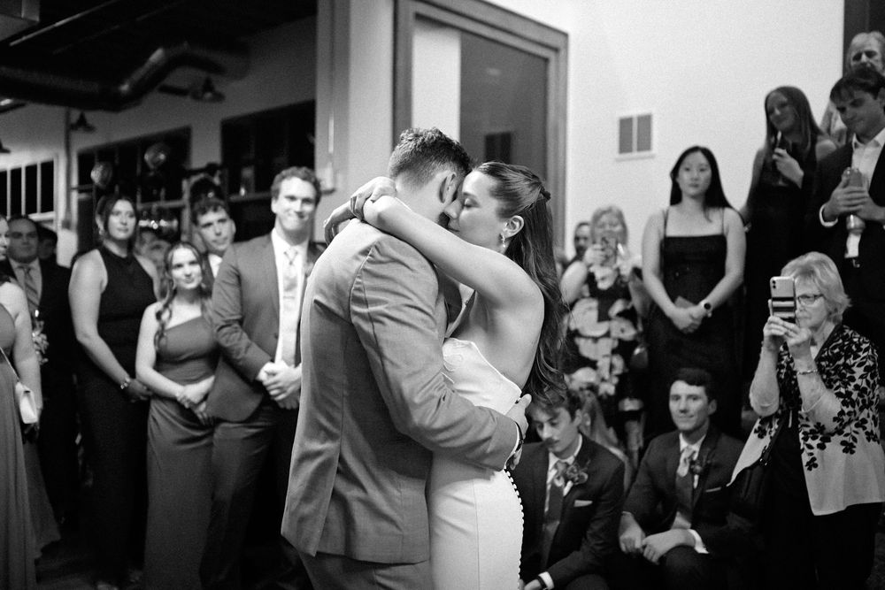 Black and white photos of wedding guests reacting emotionally during a celebration.