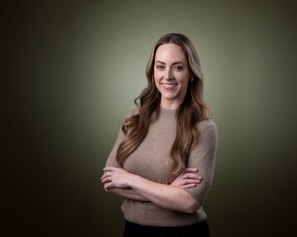 A series of professional studio portraits against a dark green background showing a person in a brown sweater.