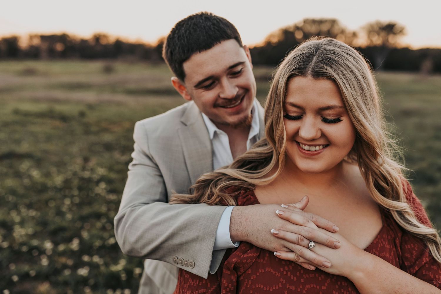Engagement photos at Murrell Park scenic field near Grapevine Lake.