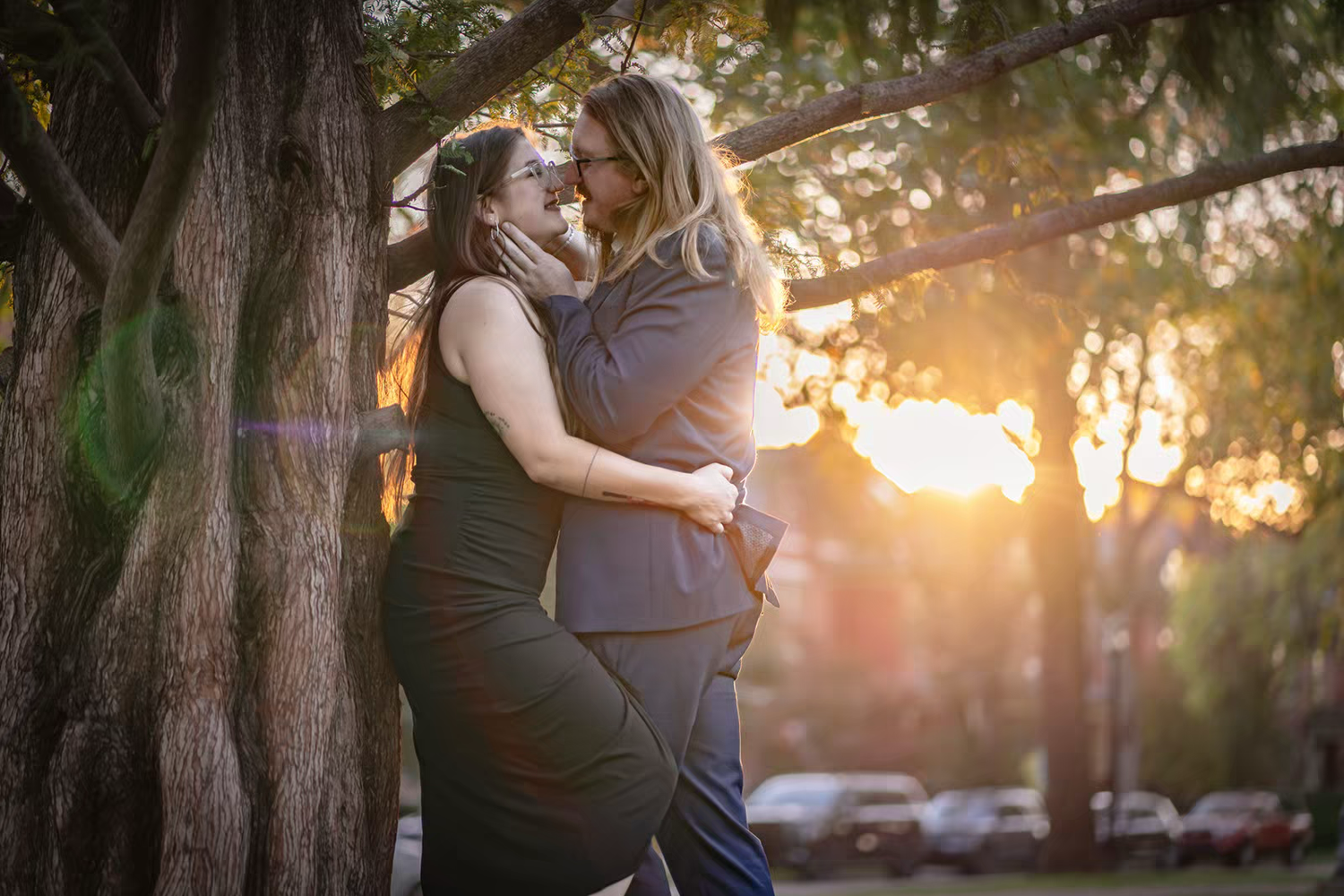 A romantic couple pose for engagement session
