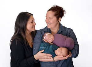 A sequence of four intimate family photos showing tender moments between parents and a newborn baby.