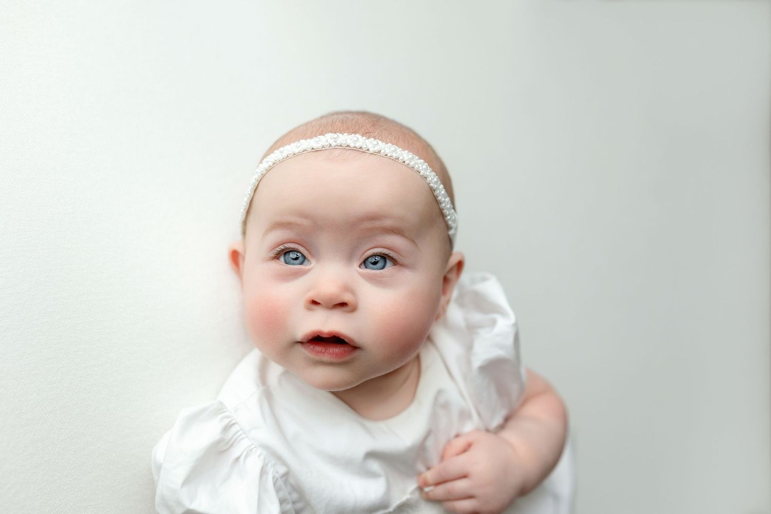 A big blue-eyed baby girl. Greenville SC newborn photographer, Easley SC newborn photographer, Upstate newborn photographer