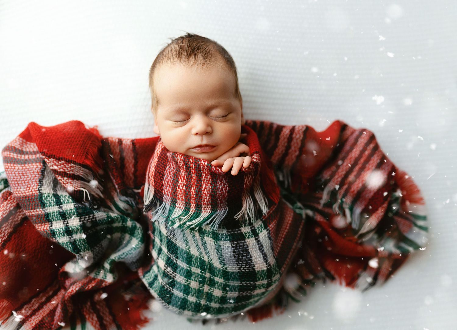 Newborn baby boy in Christmas wrap. - Greenville, SC newborn photographer - Easley, SC newborn photographer.