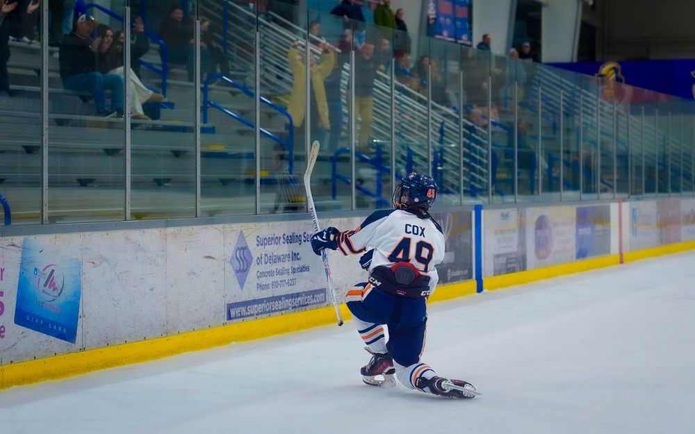 HHS hockey player celebrating a goal at Flyers Cup quarterfinals vs West Chester by Deanna Fox, SportsFox Photography, Hershey PA.