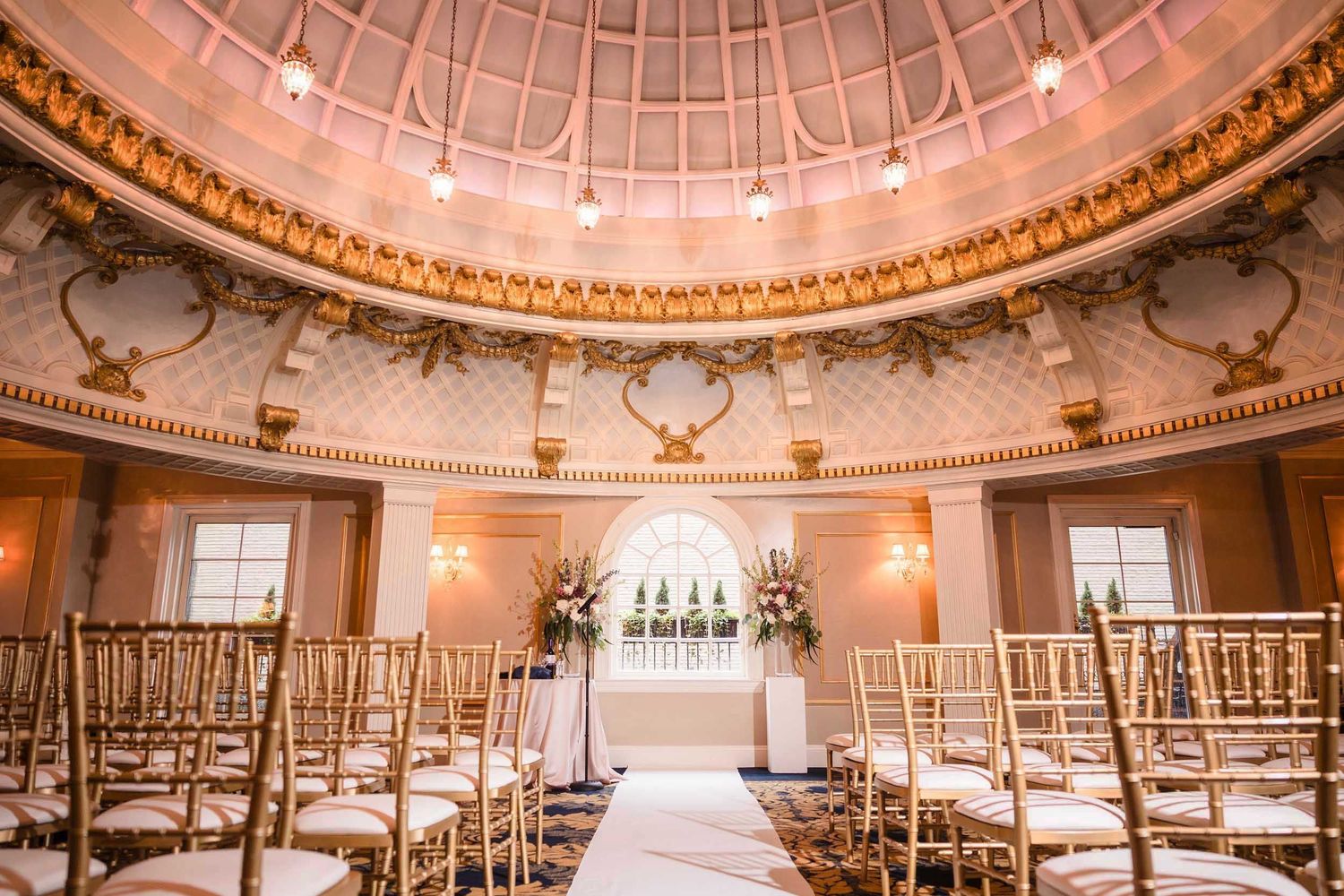 Lenox Hotel Boston Dome Room wedding ceremony space with gold detailing and chandelier lighting